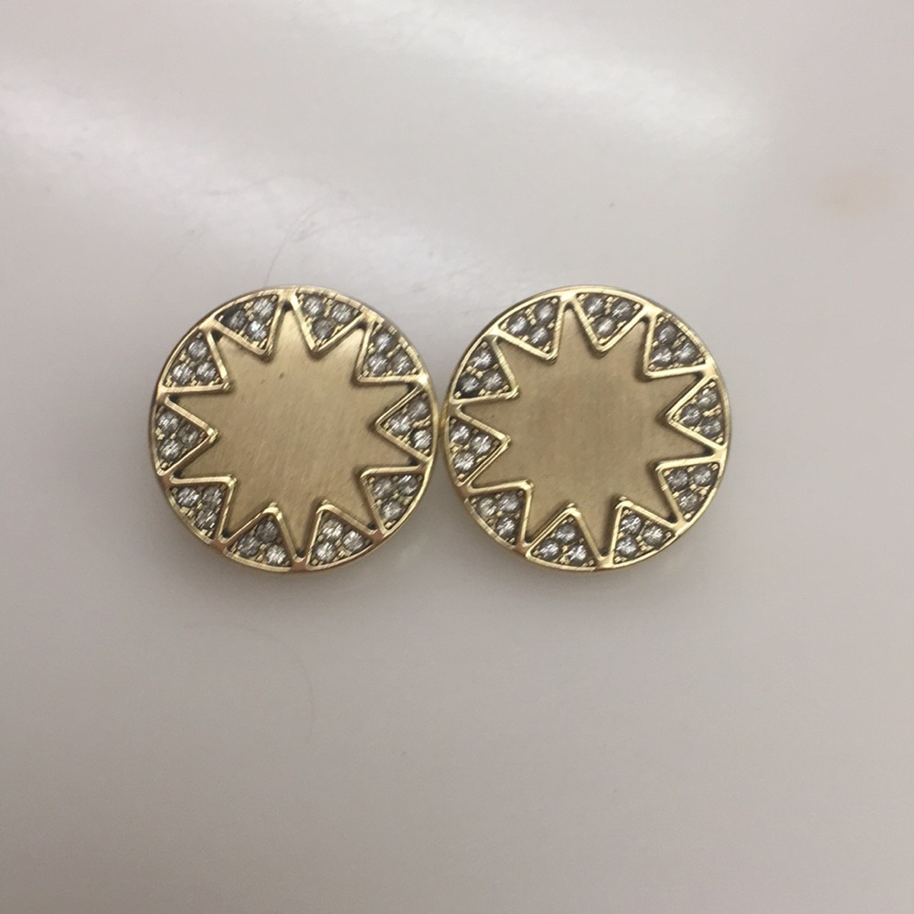 Gold House of Harlow earrings with stones